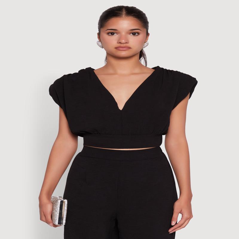 Chic Crepe Knit Blouse with Padded Shoulders and Tie Back